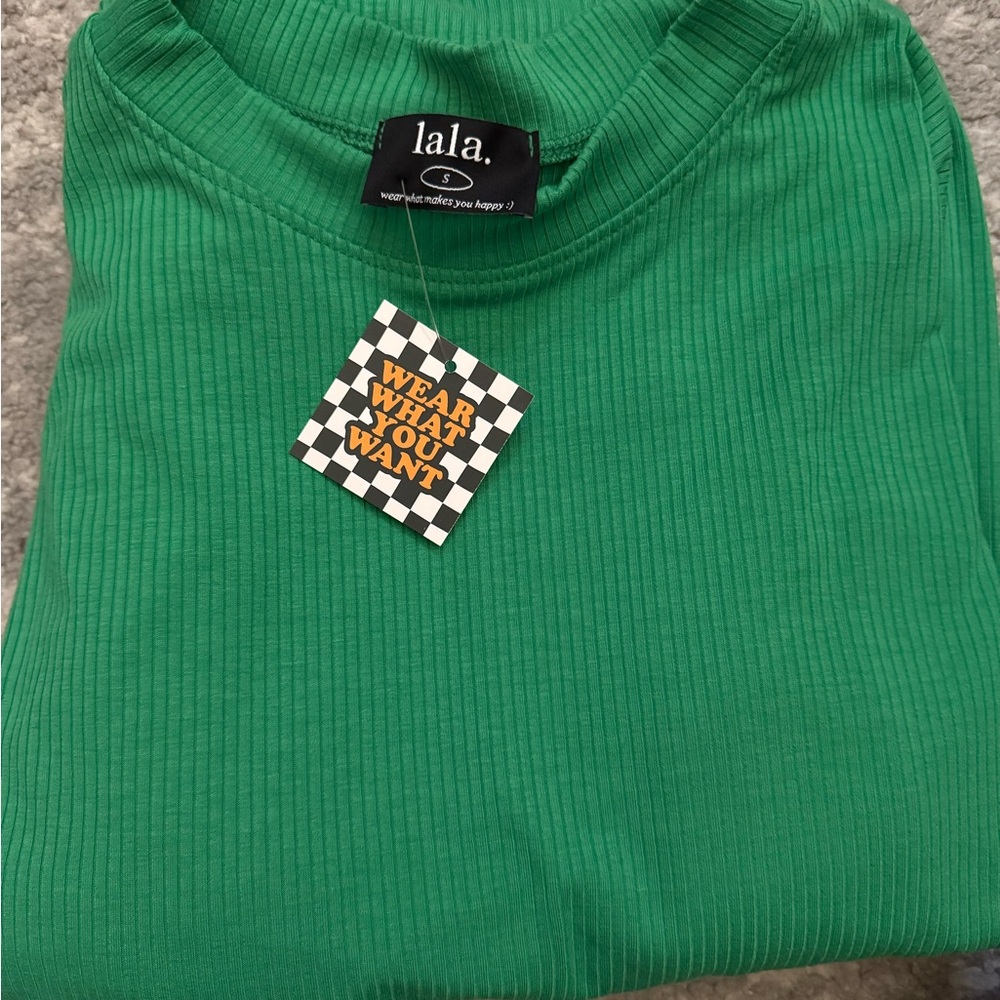 Dressed in lala ribbed green set. Top and bottom. Never worn. Tags attached.
